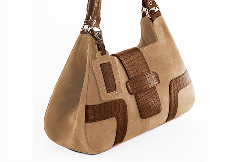 Handcrafted women's luxurious elegant handbag in premium tan beige and caramel brown leather. Perfect for elevated everyday style.   
                Choose from our luxurious collections of leather and fabric to perfectly match your handbags to your outfits.